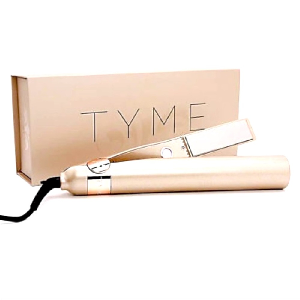 Tyme Iron. Lightly used. Comes with bag (no box).